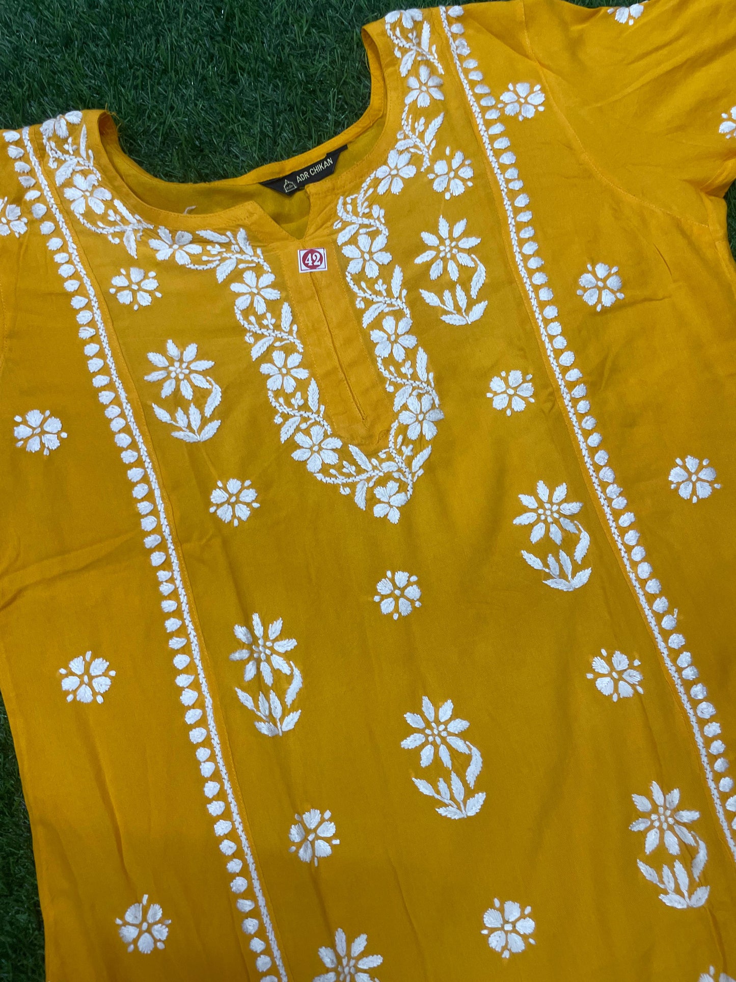 Mira Chikankar Rayon Handwork Straight Short Kurti.